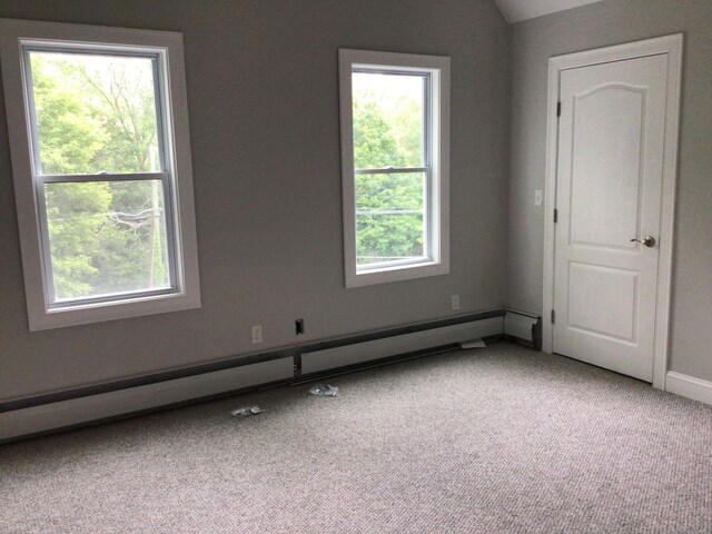 111 Pineville Rd, Killingly, CT 06241 - carpeted spare room with healthy amount of natural light, baseboard heating, baseboards, and lofted ceiling