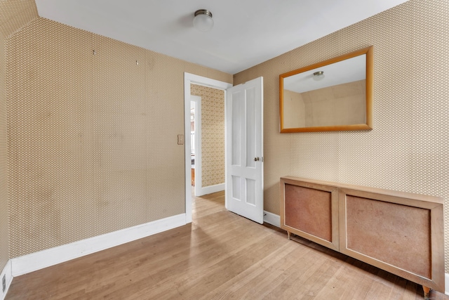 empty room with light wood-type flooring