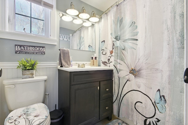 bathroom with vanity and toilet