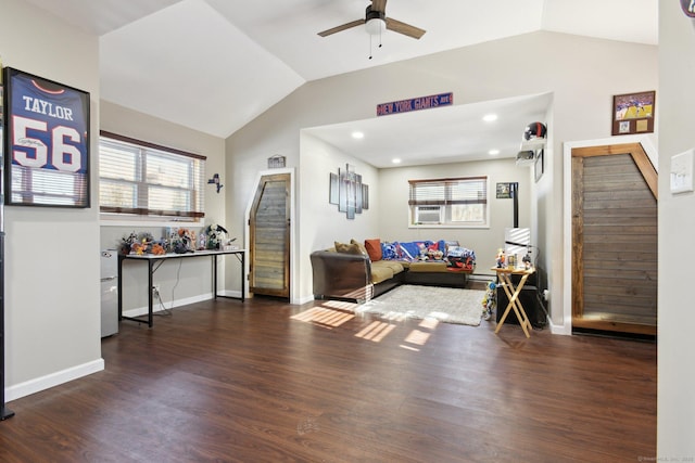 living room featuring dark wood-type flooring, ceiling fan, lofted ceiling, and cooling unit