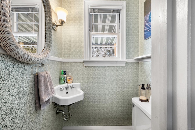 bathroom with sink and toilet