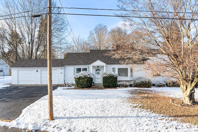 ranch-style home with a garage