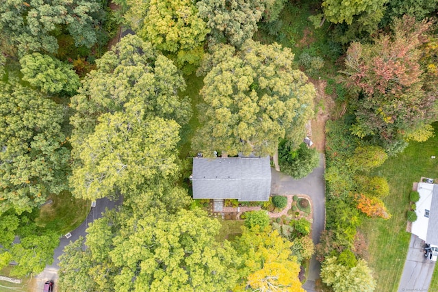 bird's eye view featuring a forest view