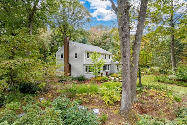 view of front of property featuring a chimney