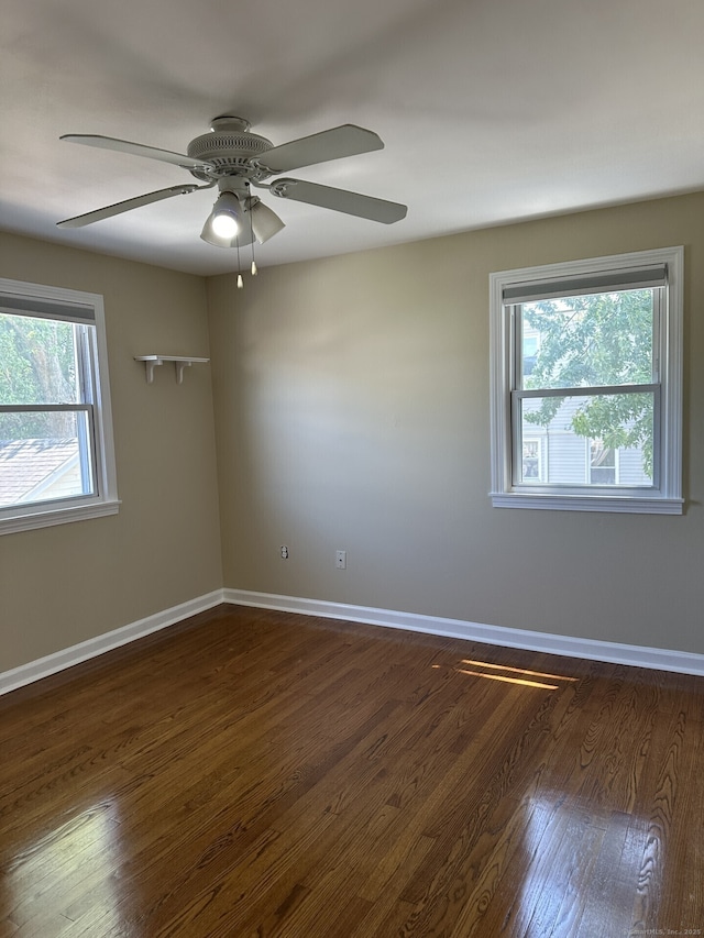 unfurnished room featuring dark hardwood / wood-style floors