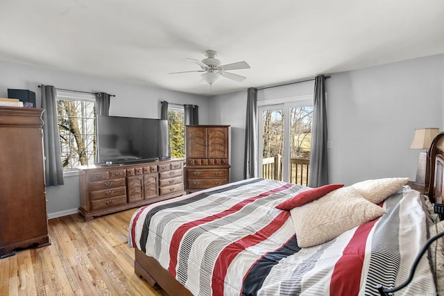 bedroom with access to exterior, light hardwood / wood-style flooring, and ceiling fan