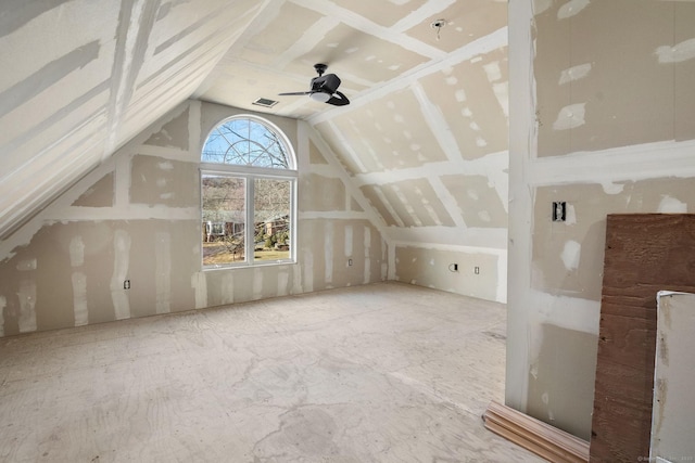 bonus room with lofted ceiling and ceiling fan