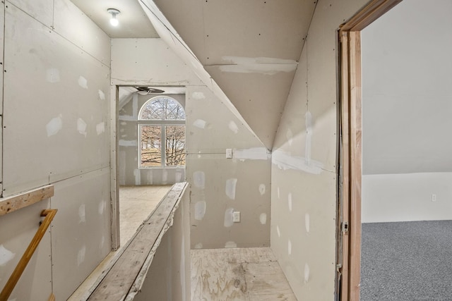 bathroom with vaulted ceiling