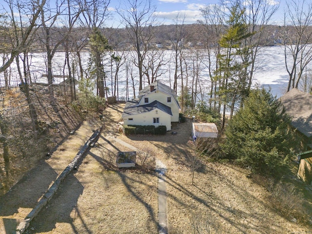 bird's eye view with a water view