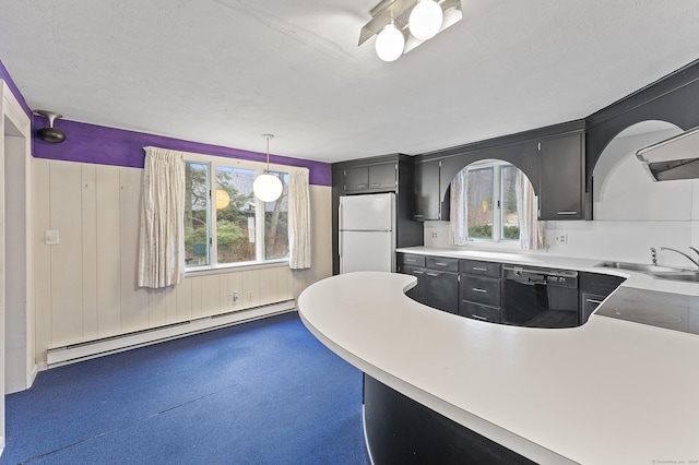 kitchen with sink, hanging light fixtures, white refrigerator, a baseboard radiator, and dishwasher