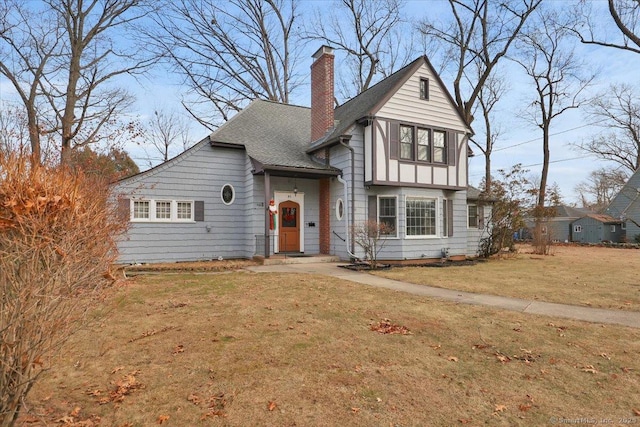 view of front of home with a front yard