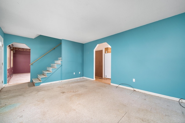 unfurnished room with carpet flooring