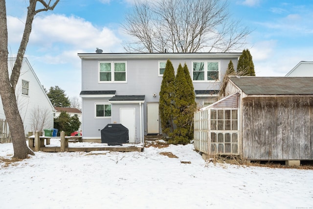 view of snow covered property