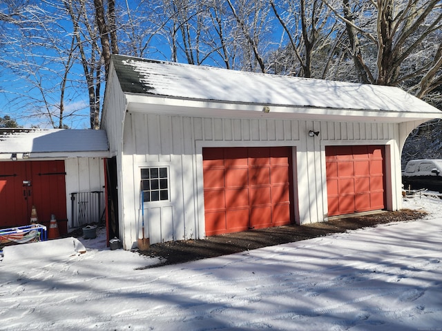 view of snow covered garage