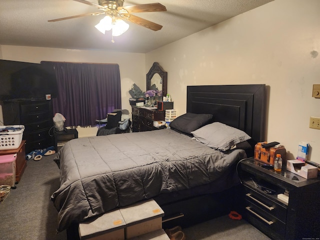 carpeted bedroom with a textured ceiling and ceiling fan