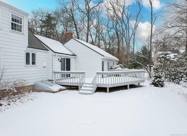 view of snow covered deck