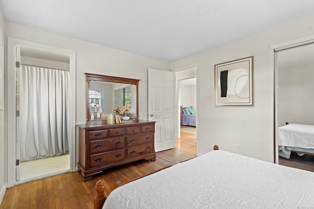 bedroom featuring hardwood / wood-style flooring