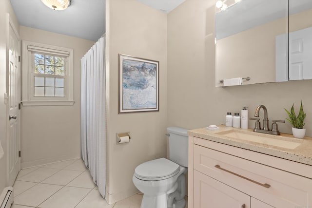 bathroom featuring toilet, baseboard heating, tile patterned flooring, and vanity