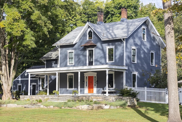 view of front of home with a front lawn and a porch