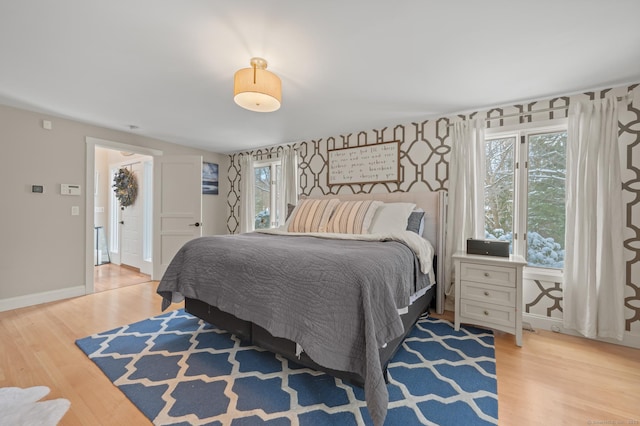 bedroom with wood-type flooring