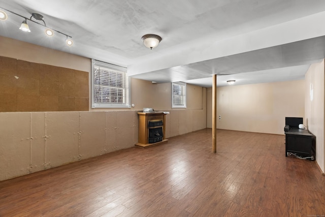 basement featuring hardwood / wood-style flooring