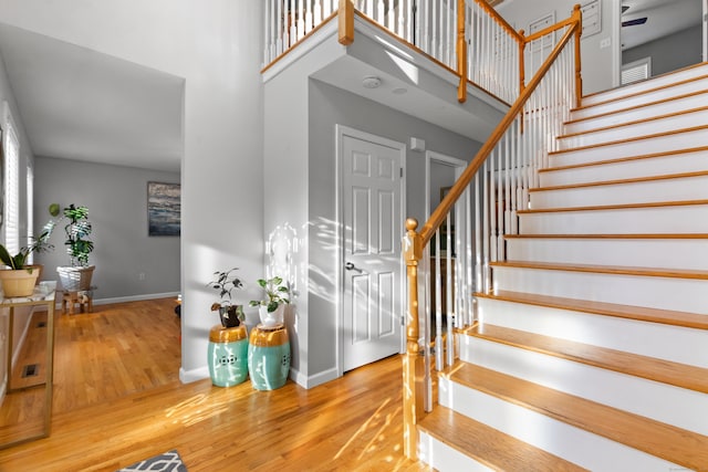 staircase featuring hardwood / wood-style floors