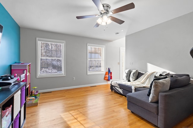 interior space with light hardwood / wood-style flooring and ceiling fan