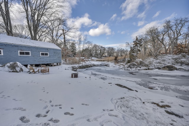 view of yard covered in snow