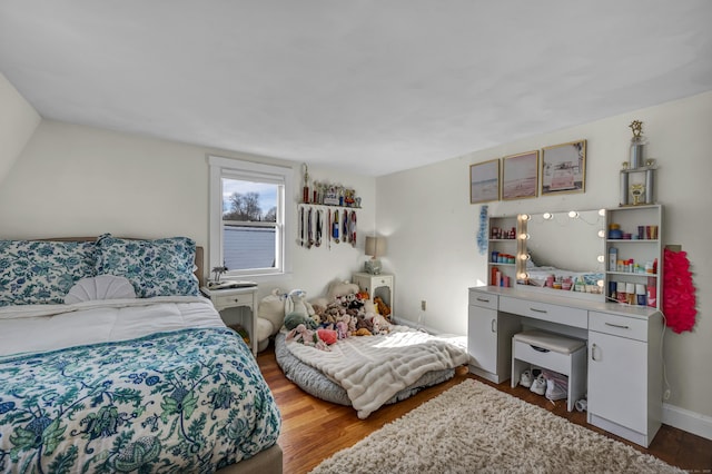 bedroom featuring hardwood / wood-style flooring