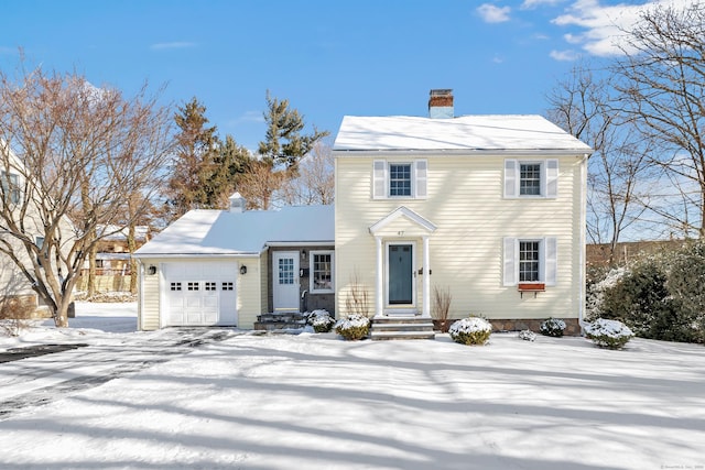 view of front of property featuring a garage