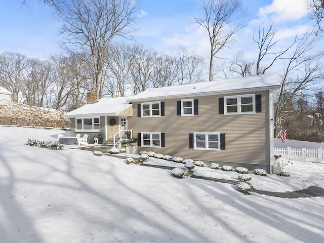 view of snow covered property