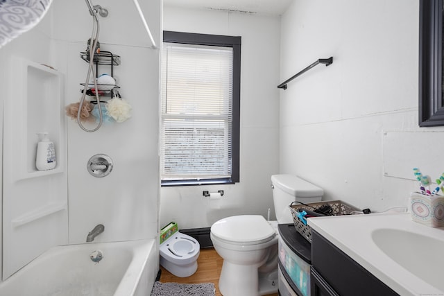 full bathroom featuring shower / bathing tub combination, wood-type flooring, toilet, and vanity