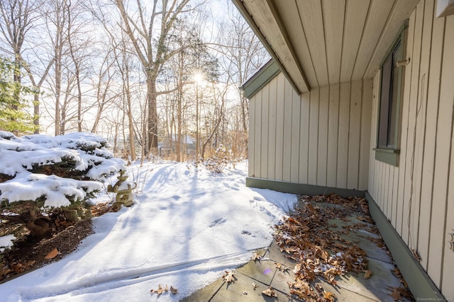 view of yard layered in snow