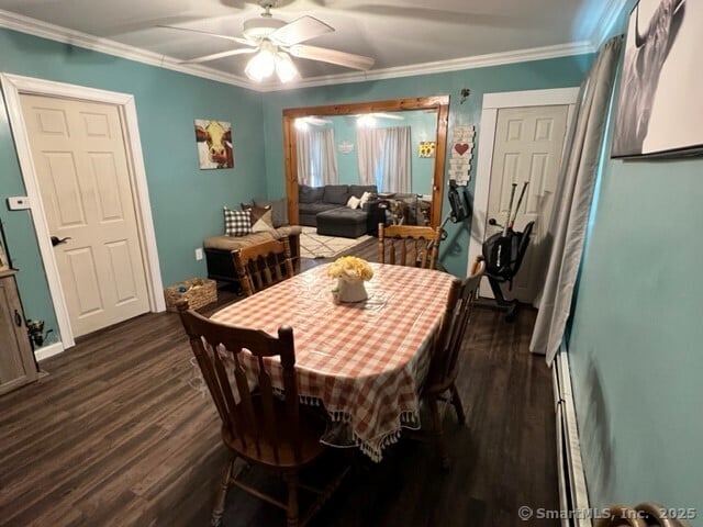 dining area featuring ceiling fan, dark hardwood / wood-style flooring, and ornamental molding