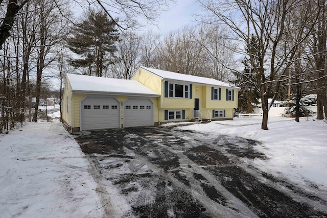 raised ranch featuring a garage