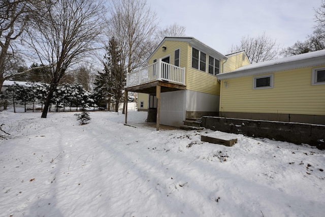 view of snow covered property