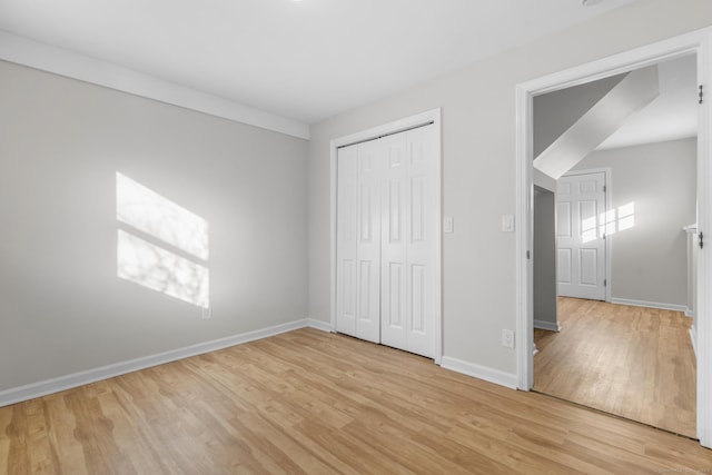 unfurnished bedroom with light hardwood / wood-style flooring