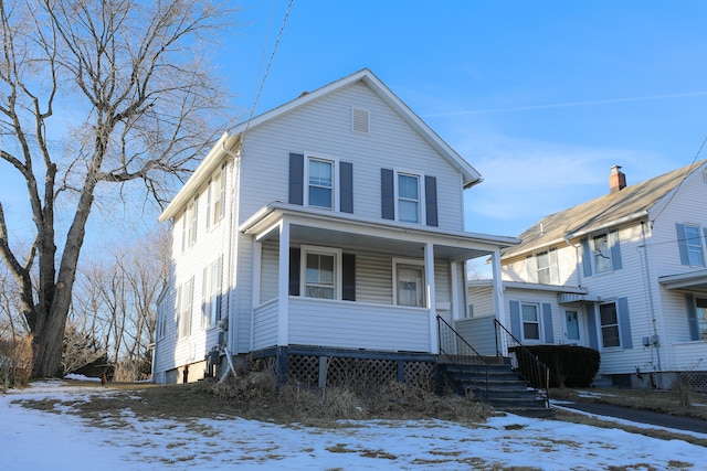 front facade featuring covered porch