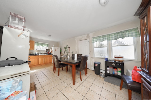 dining room with light tile patterned flooring