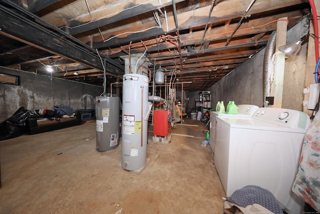 unfinished basement featuring a heating unit, washing machine and dryer, and electric water heater