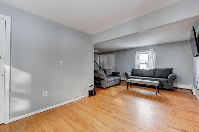 living room with light hardwood / wood-style floors