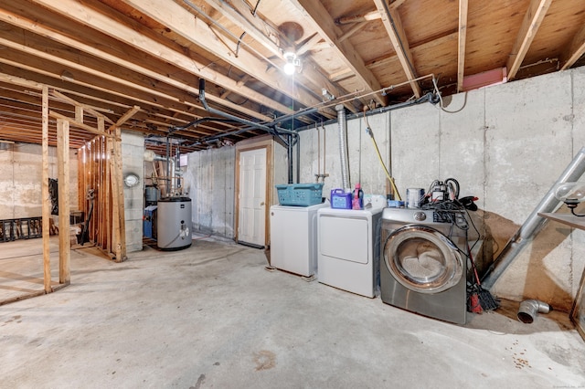 basement with washing machine and clothes dryer and water heater