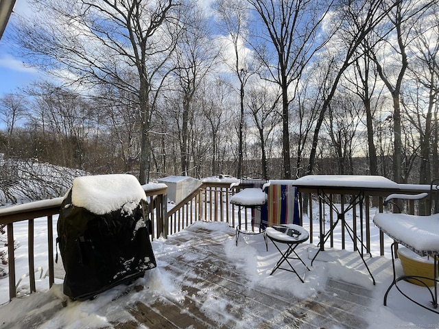 view of snow covered deck