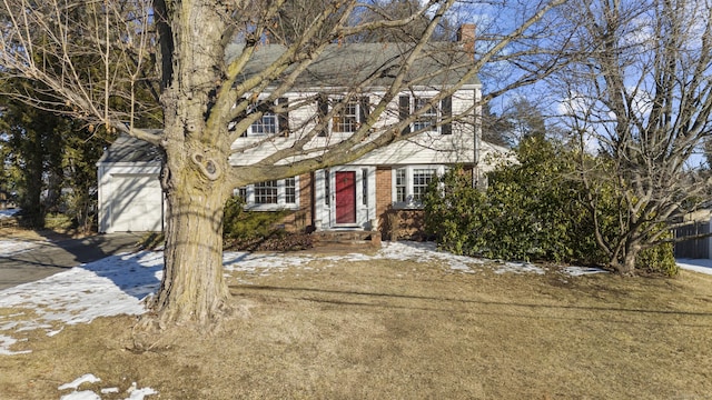 colonial house with a lawn