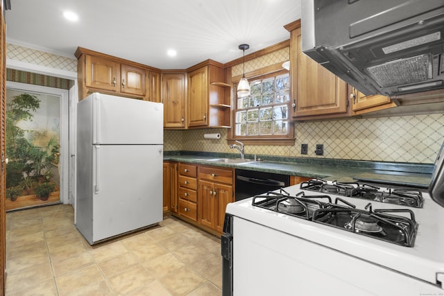 kitchen with sink, white appliances, hanging light fixtures, tasteful backsplash, and ornamental molding