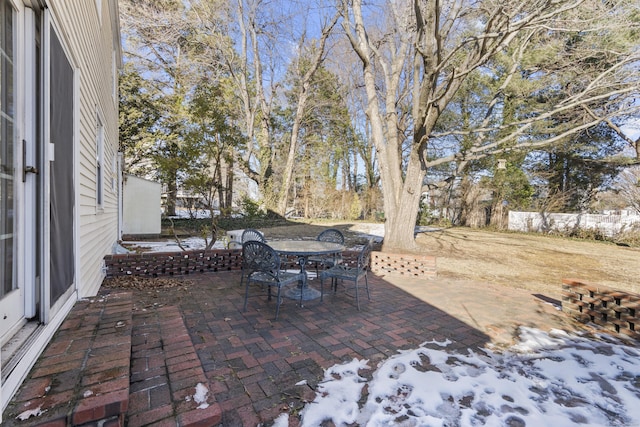 view of snow covered patio