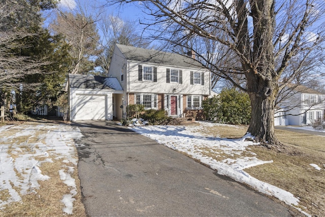 colonial-style house with a garage