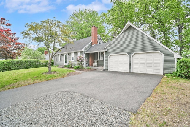 4 Sparkle St, Enfield, CT 06082 - view of front of property with an attached garage, asphalt driveway, a front yard, a chimney, and roof with shingles