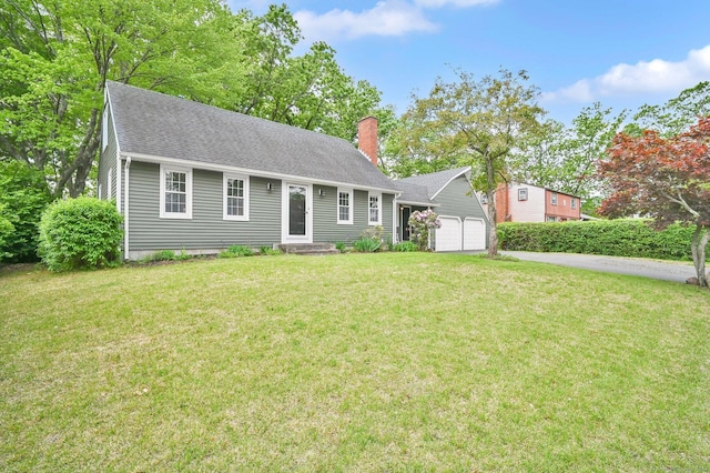 4 Sparkle St, Enfield, CT 06082 - view of front of house with a chimney, a garage, a front lawn, and roof with shingles