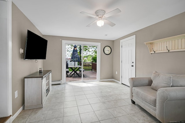 4 Sparkle St, Enfield, CT 06082 - living area featuring a baseboard heating unit, a ceiling fan, baseboards, and light tile patterned floors